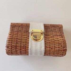 Woven rattan clutch with white leather trim